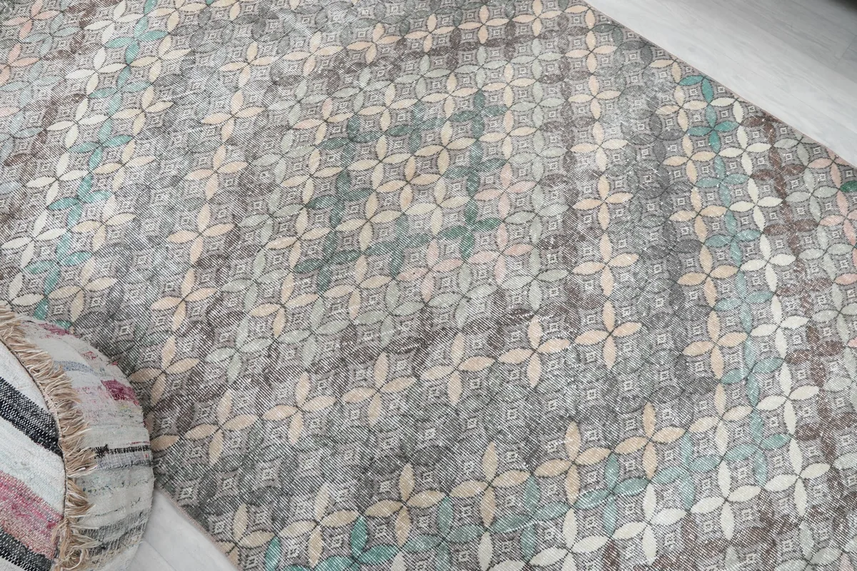 Overhead angled shot highlighting the overall design and color variations across the rug's surface