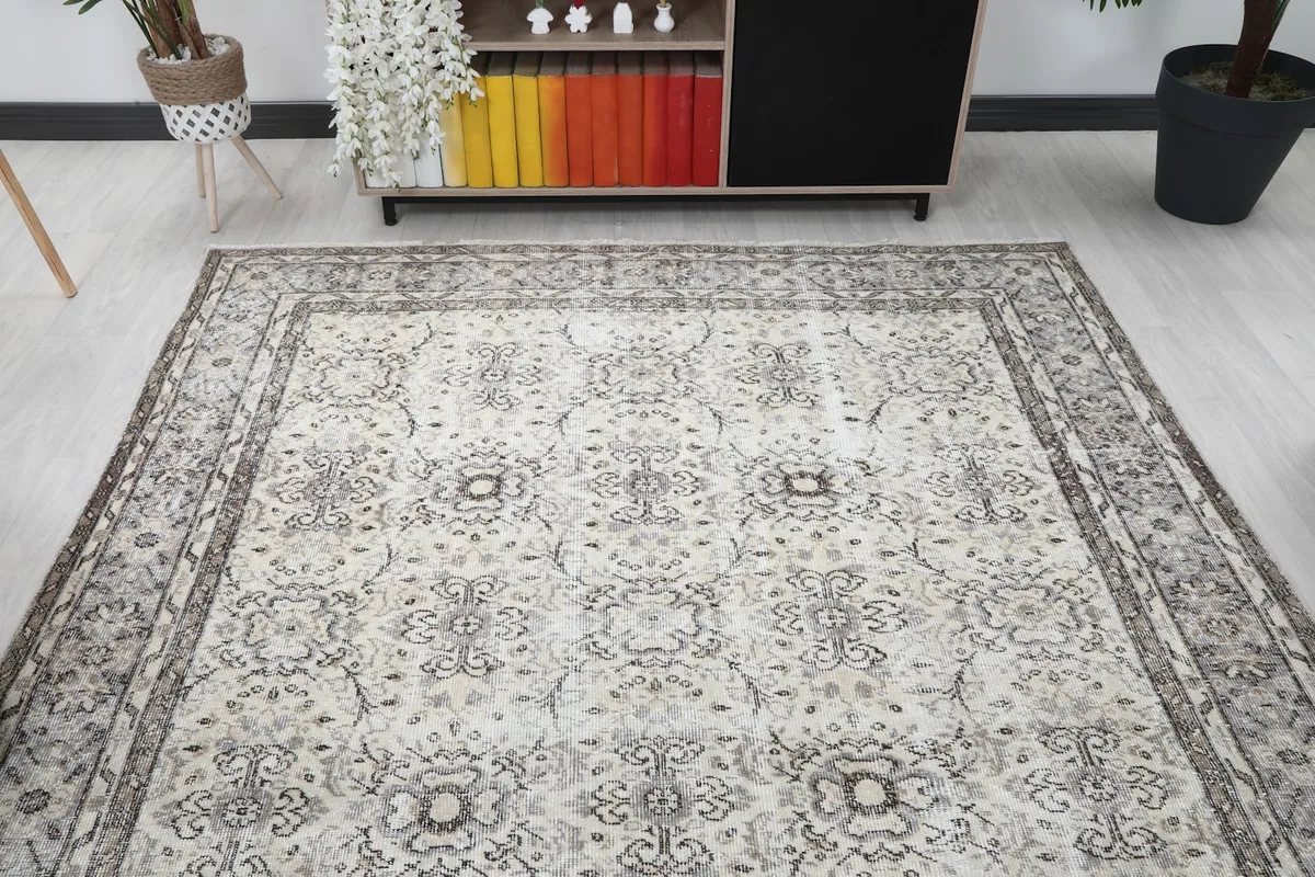Overhead view of the vintage rug in a room, emphasizing its full pattern and placement