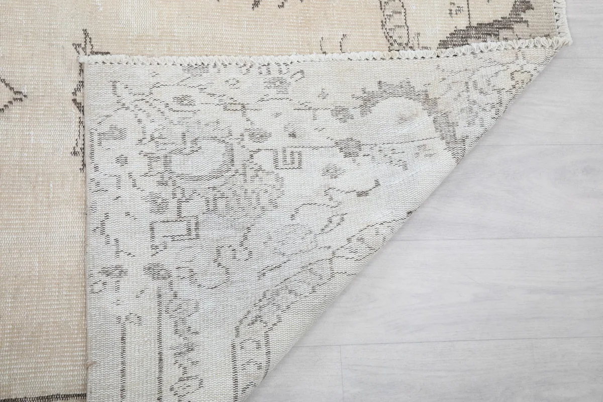 Close-up of the back of the rug, revealing the knotting and craftsmanship