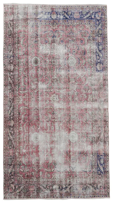 Full overhead view of the 6'6" x 10'5" rose and navy vintage Anatolian rug