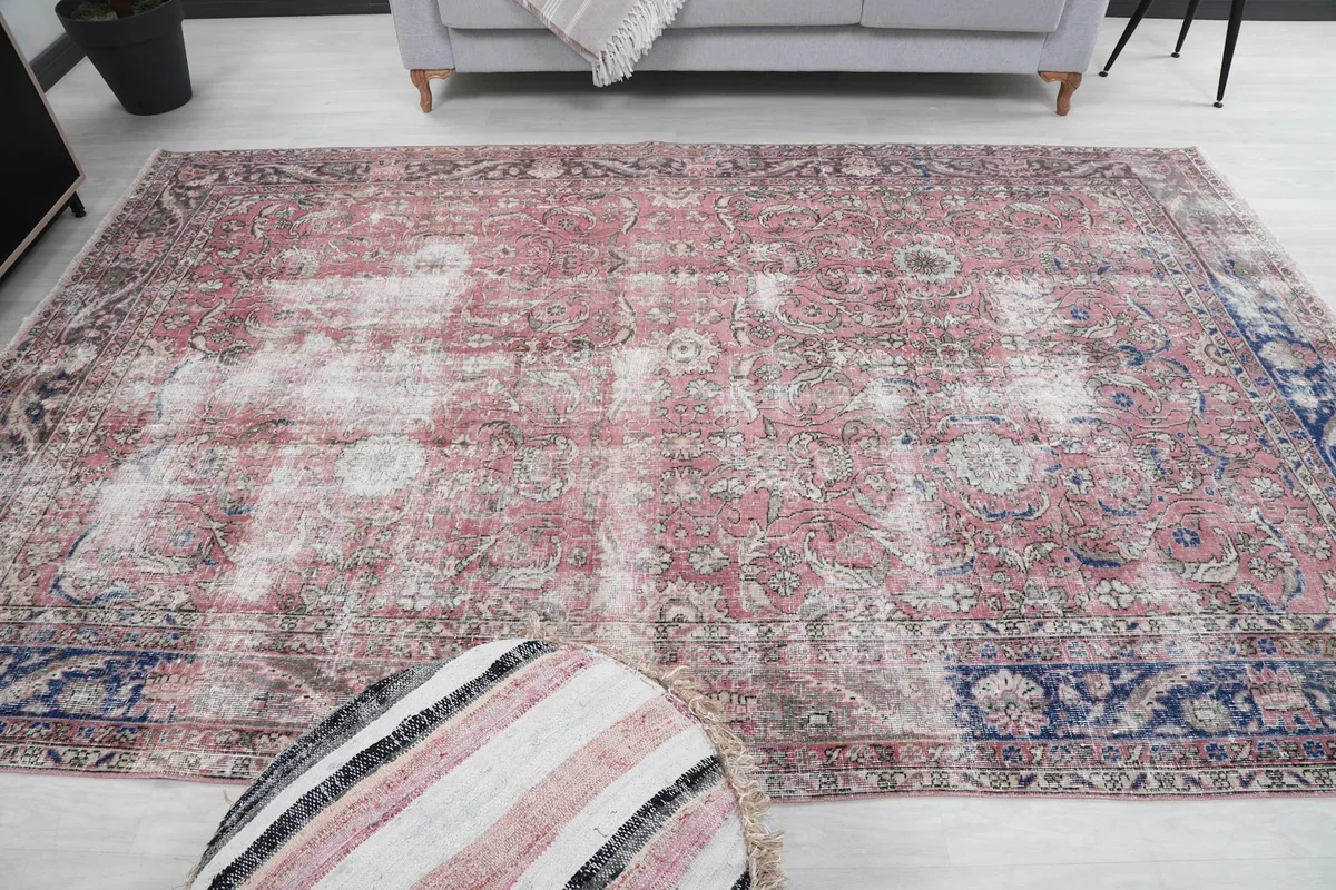 Another room view, focusing on the rug's central placement and overall aesthetic