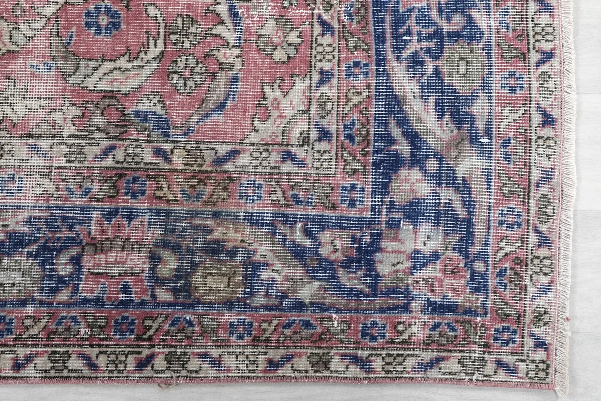 Detail of the navy border with floral and geometric patterns