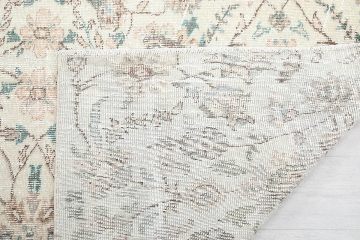 Detail of the rug's reverse side, illustrating the consistent knotting and construction