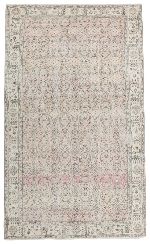 Full overhead view of the rose and ivory vintage Anatolian area rug