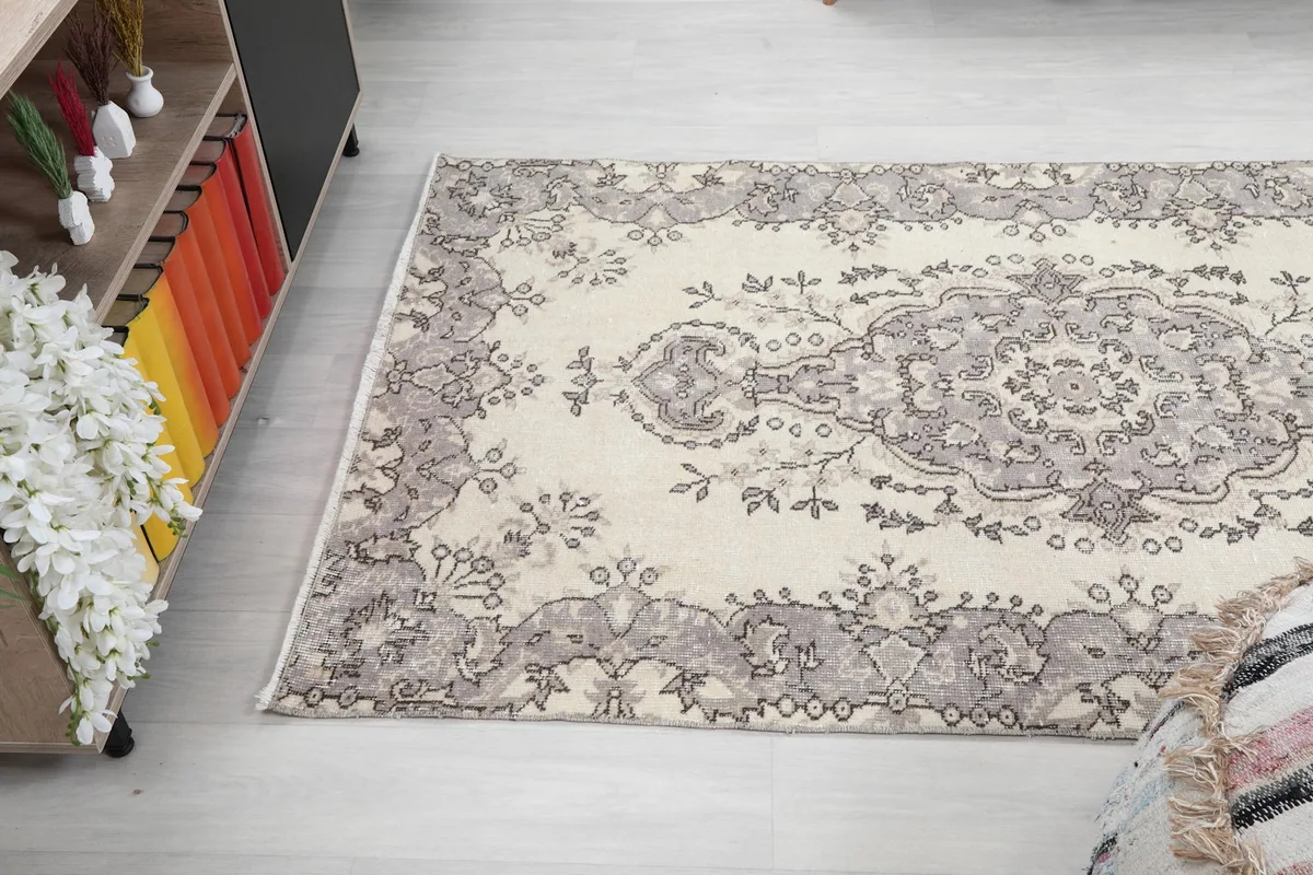 Angled view of the entire rug in the room, showcasing its rectangular shape