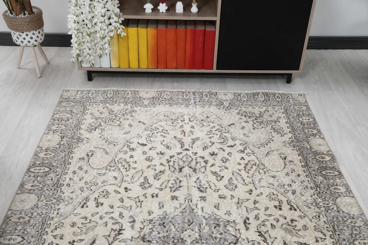 View of the rug in a room setting from the opposite end, showing its full length