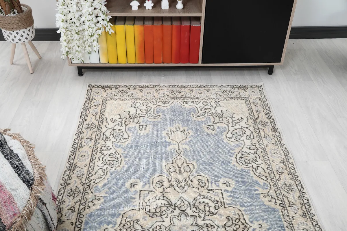 Overhead view of the rug in a room, focusing on its design and how it complements the decor