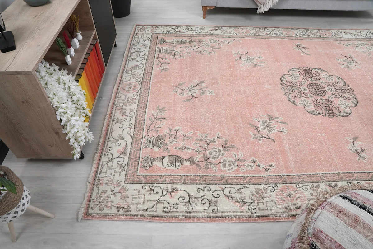 Side angle view of the rug in a room, emphasizing the overall layout and design