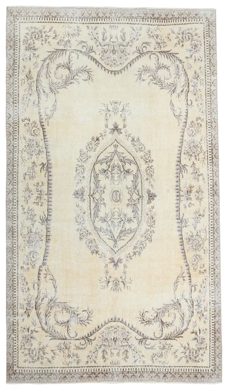 Full overhead view of the beige and gray vintage Anatolian area rug