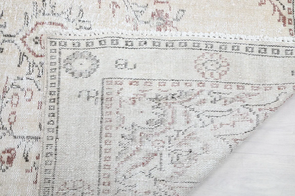 Detail of the rug's reverse side, revealing the tight knotting and craftsmanship
