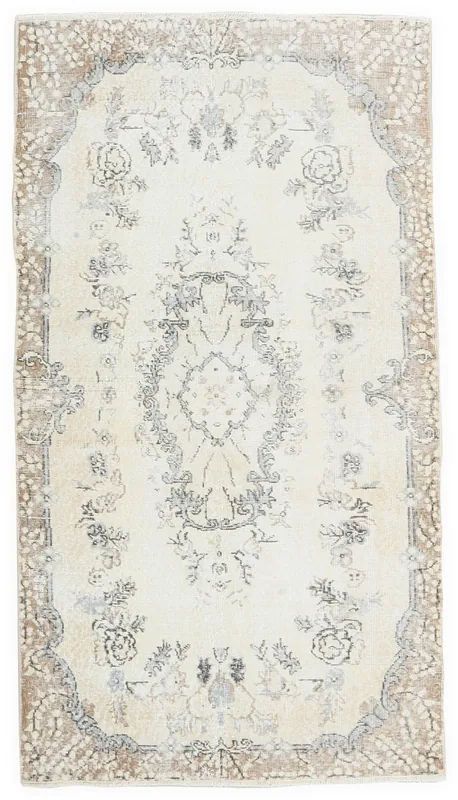 Full top view of the ivory floral medallion rug with a brown border on a white background