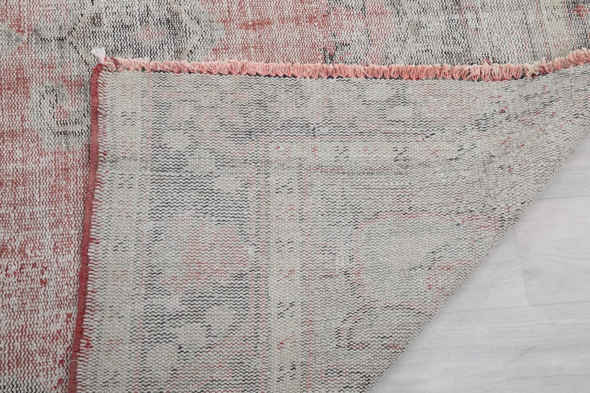 Another view of the rug's back, revealing the tight weave and craftsmanship.