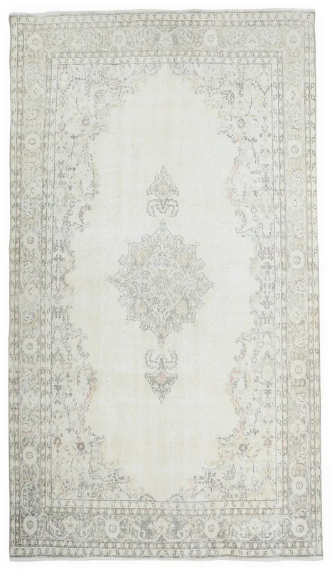 Full top view of the 6'10" x 10'0" ivory and gray vintage Anatolian rug