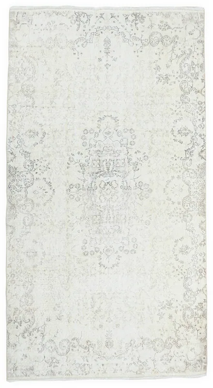 Full top view of the ivory and gray vintage Anatolian area rug