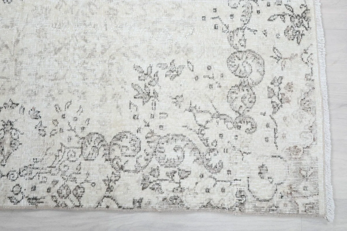 Detail view of the corner border design and subtle color variations