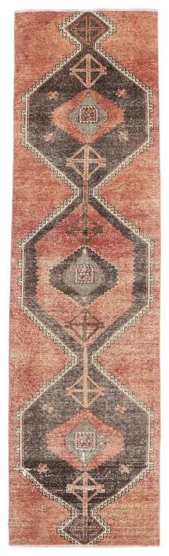Full top view of the 2'9" x 10'0" rust and charcoal geometric vintage runner