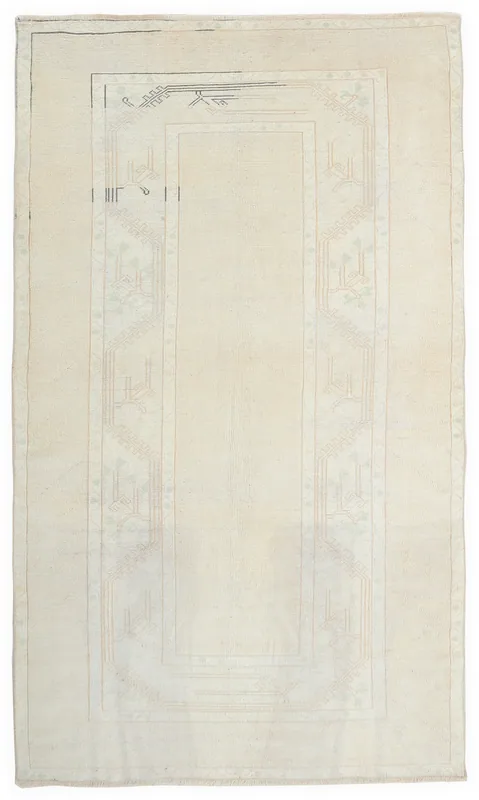Full top view of the 4'8" x 7'9" cream vintage Anatolian rug with geometric patterns on a white background.