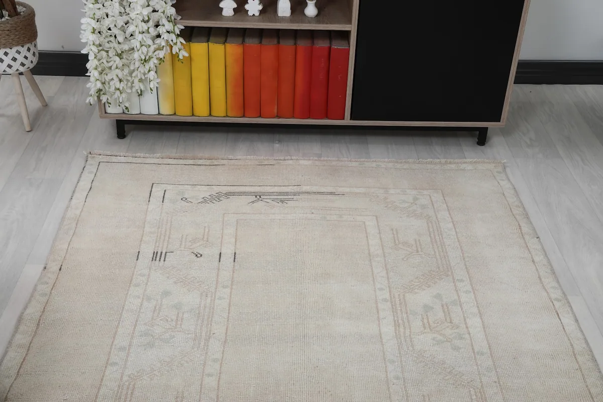 Top-down angle highlighting the central design elements and the rug's borders.
