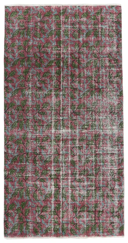 Full top view of the 5'1" x 8'5" vintage rose and green botanical Anatolian rug