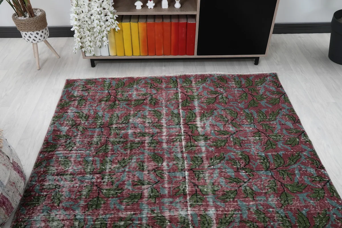 Overhead view of the rug in a room, highlighting its placement relative to furniture