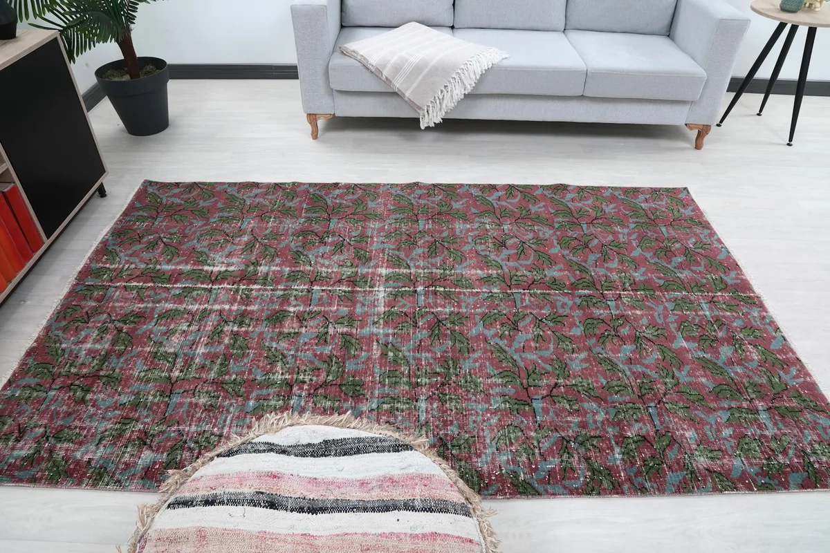Straight-on view of the rug centered in a modern living room setup