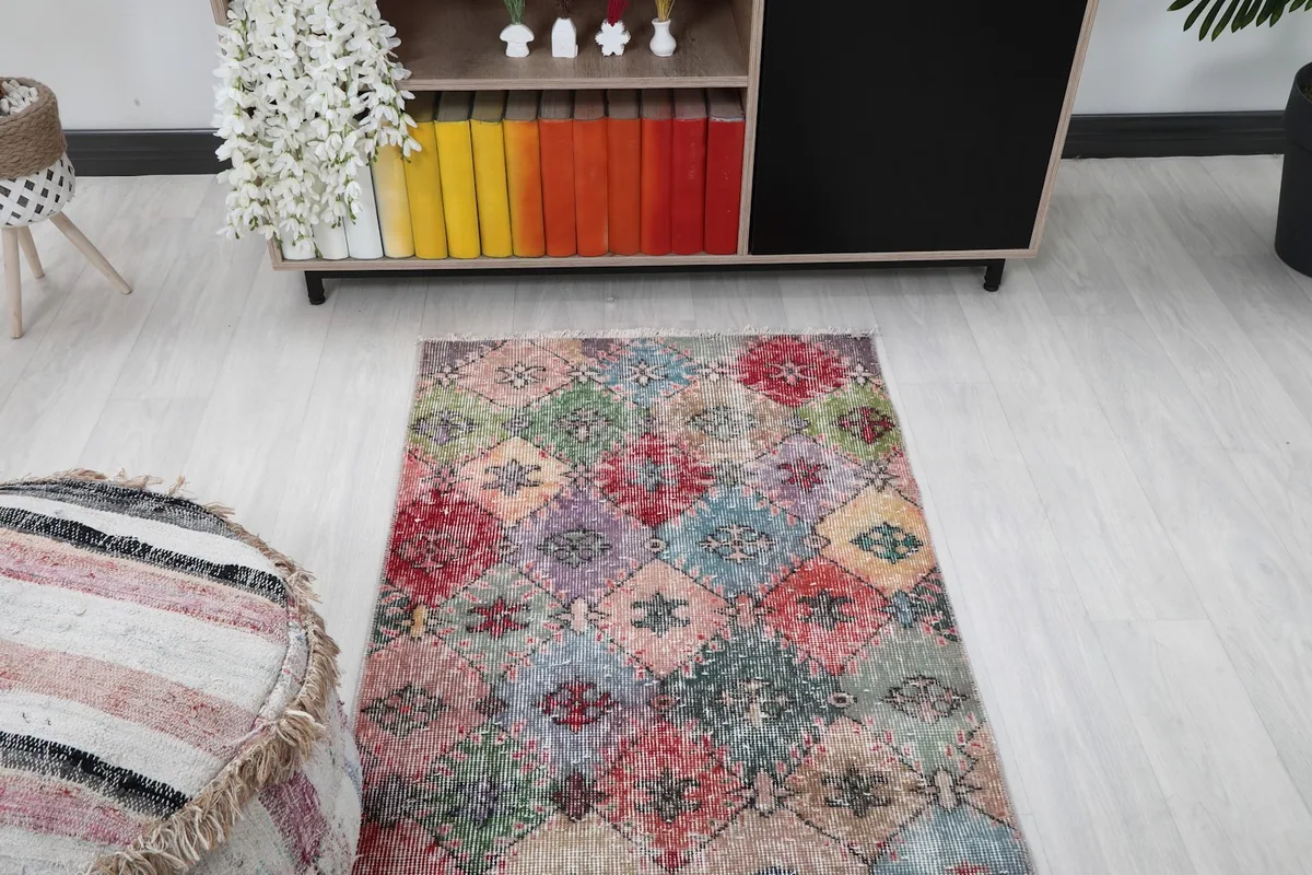 Overhead shot of the rug in a room, capturing the full pattern from a higher perspective