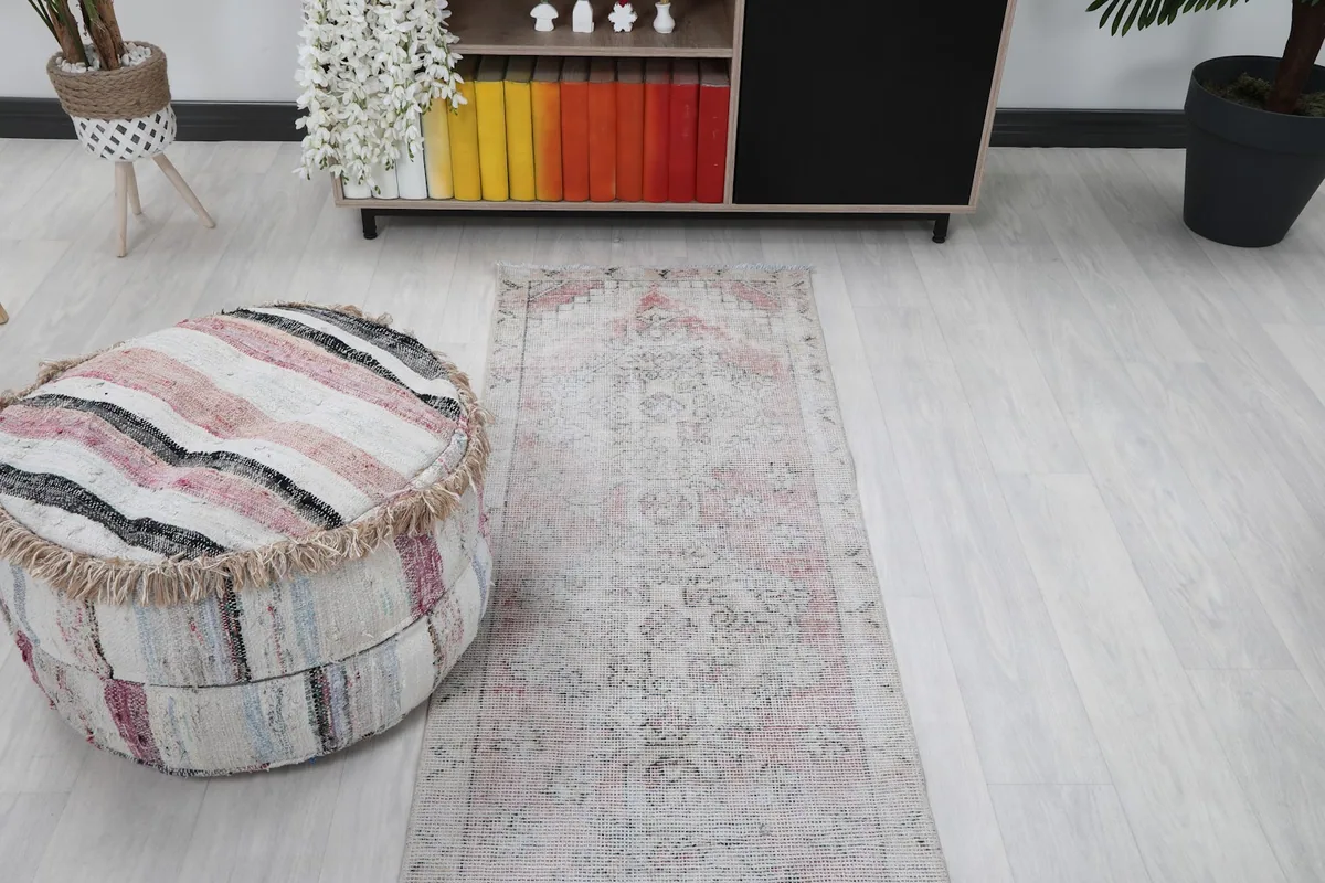 Overhead view of the runner rug in a room, showing its length and placement