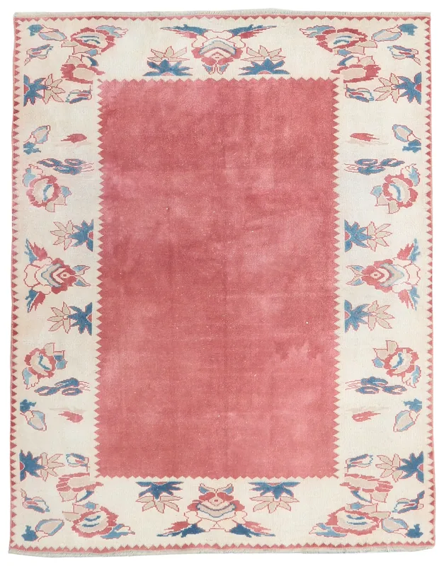 Full top view of the rose and ivory vintage Anatolian rug with floral motifs