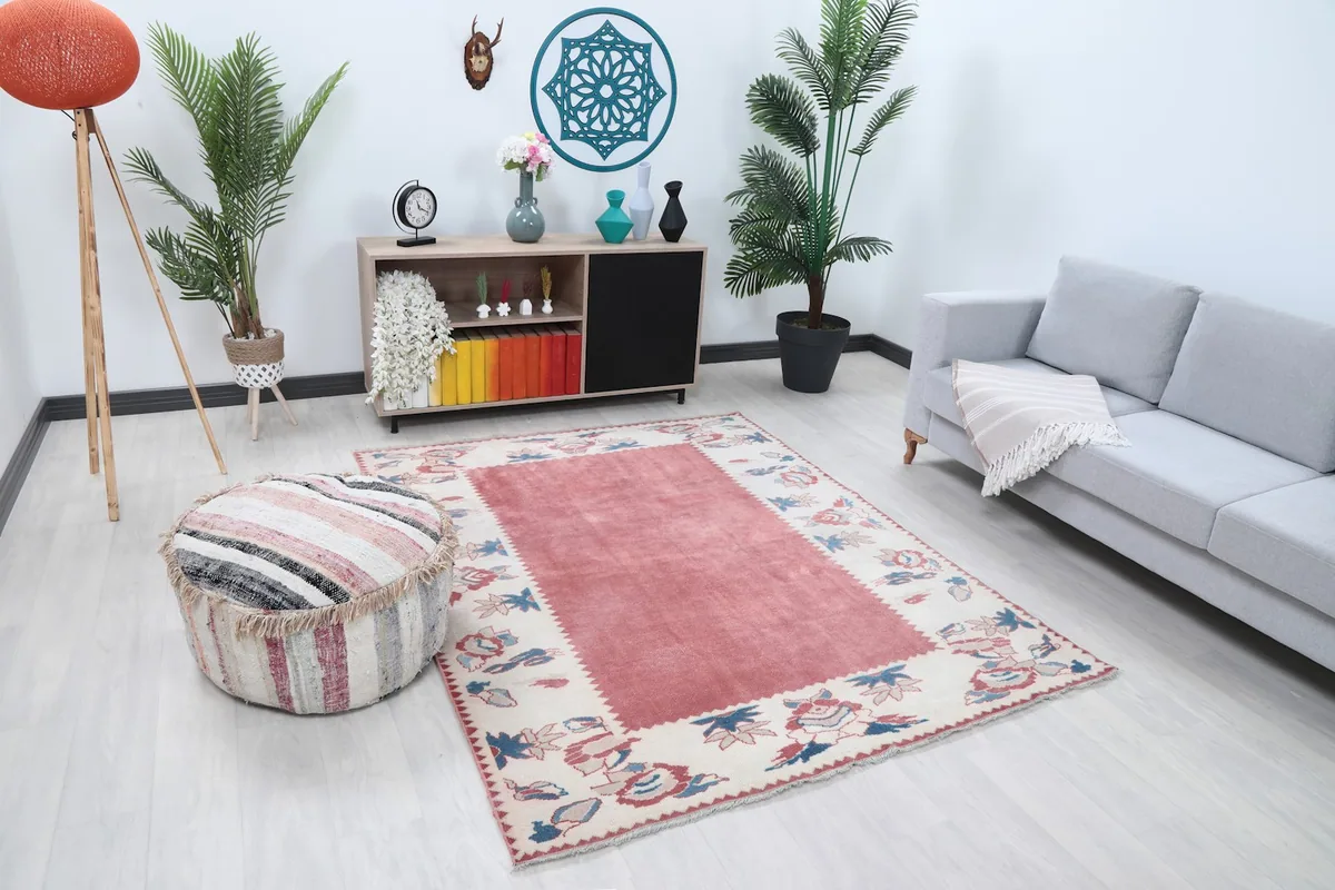 Angled view of the vintage Anatolian rug in a modern living space
