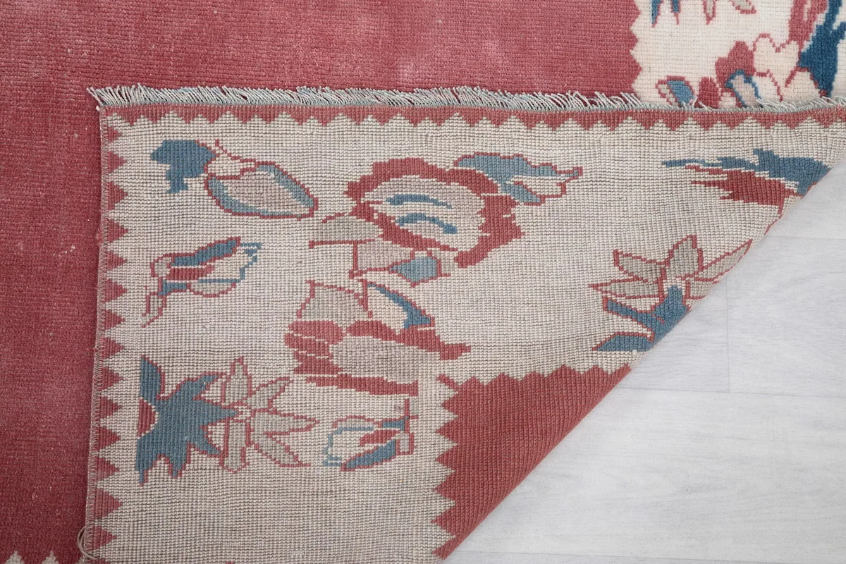 Close-up of the back of the rug revealing the intricate hand-knotting