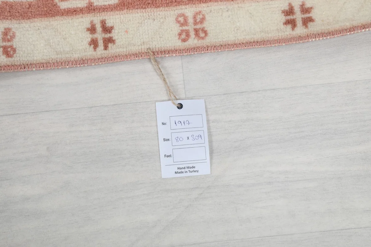 Product tag with rug details including size 80 x 309 cm and origin (Made in Turkey).