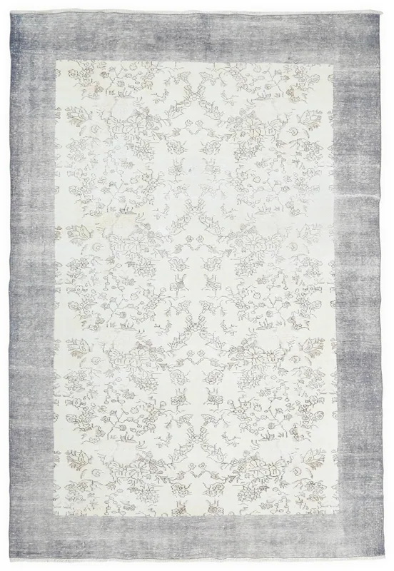 Full top view of ivory floral rug with gray border on a white background