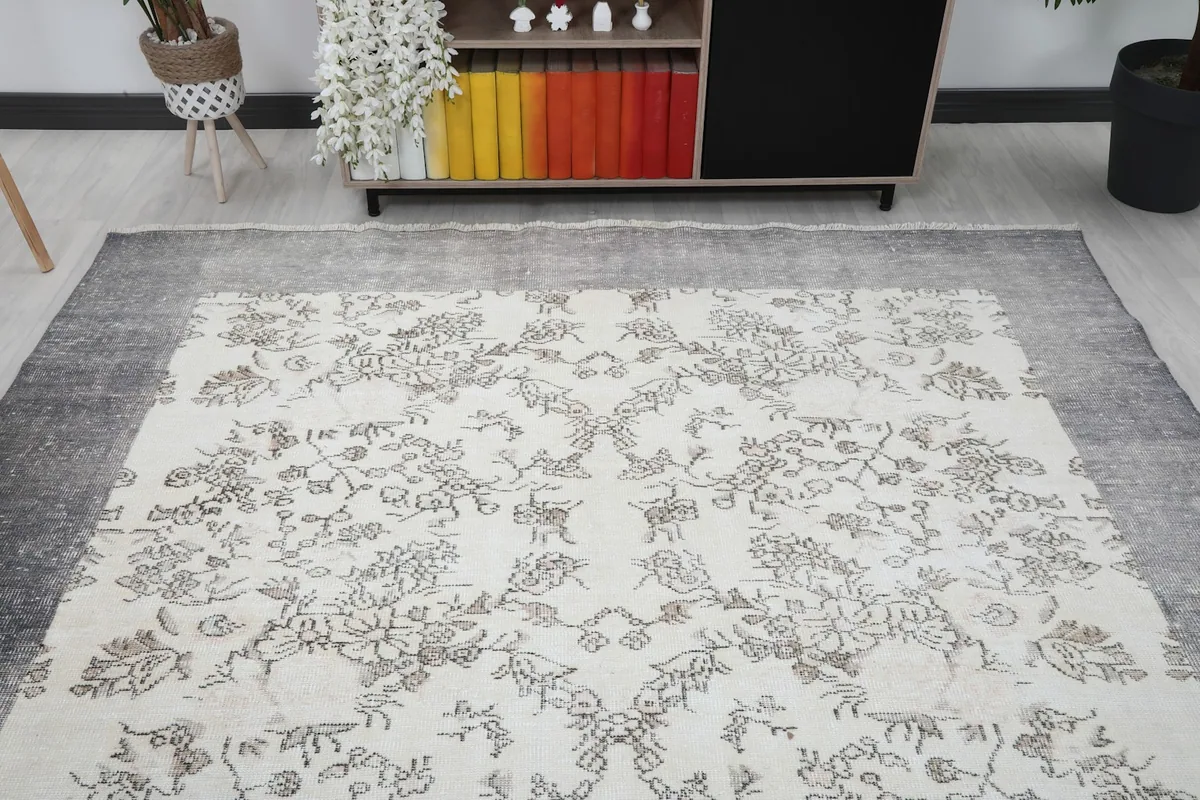 Overhead view of the rug in a living room, showing its full design and scale
