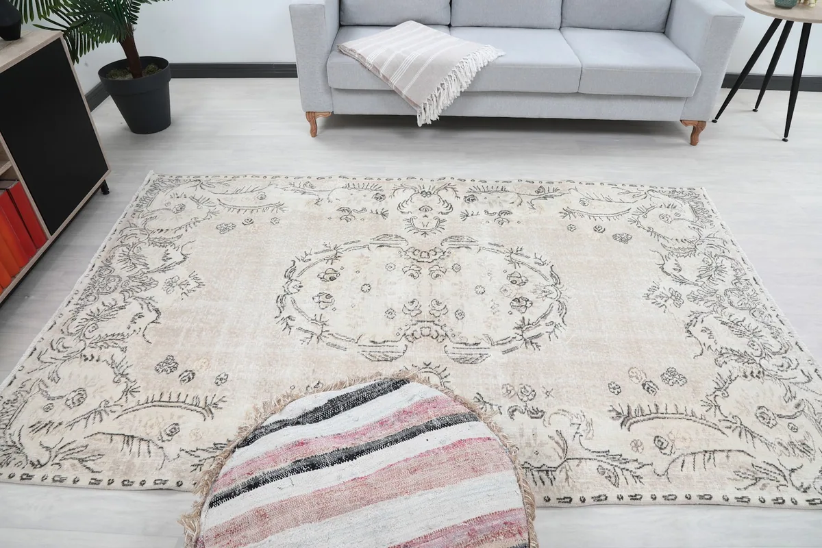 Overall room shot, providing a sense of the rug's scale and presence