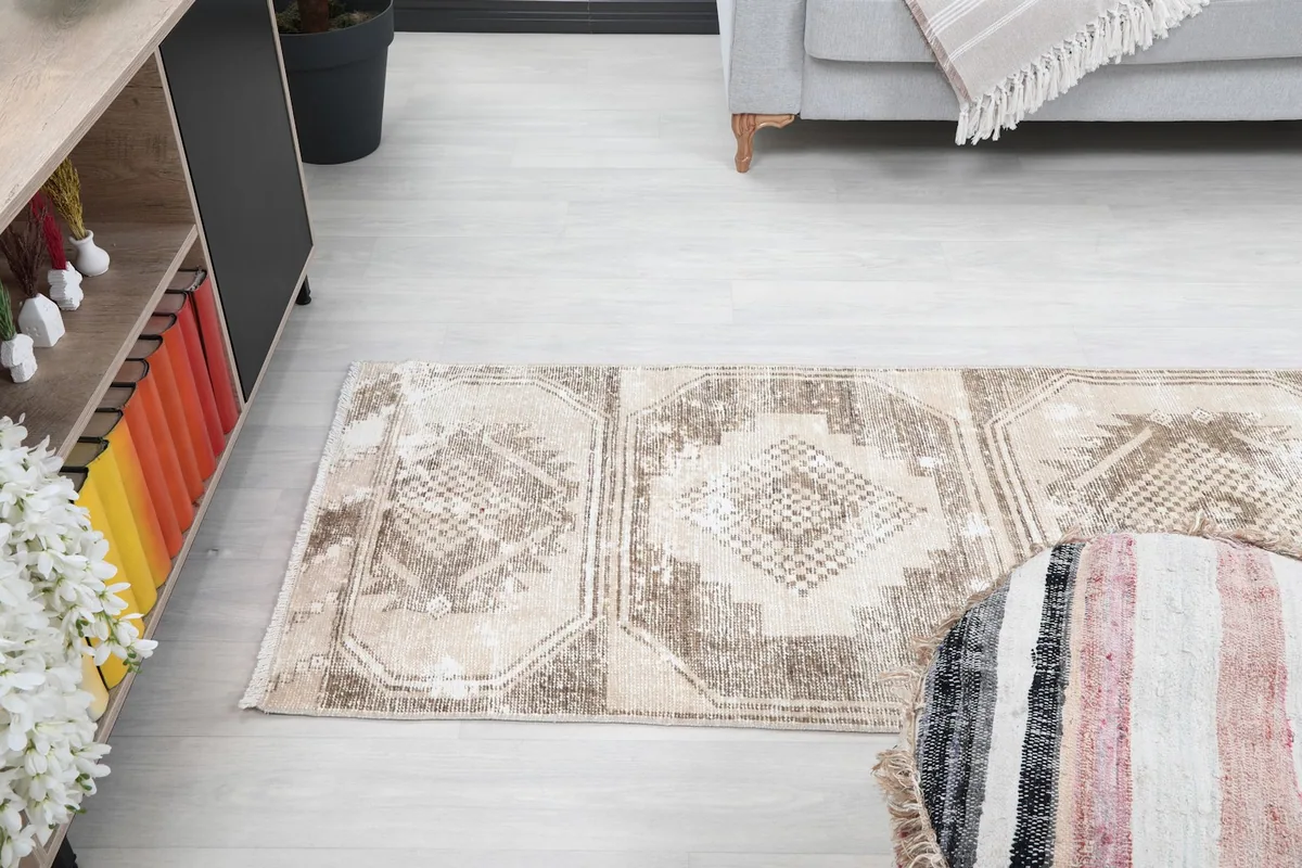 Overhead view of the rug in a room, showing its placement relative to furniture