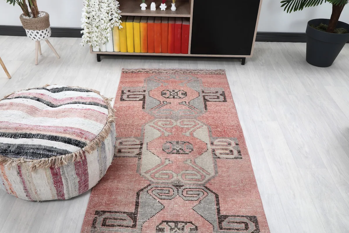 Overhead view of the rose runner rug in a room, highlighting its length and design