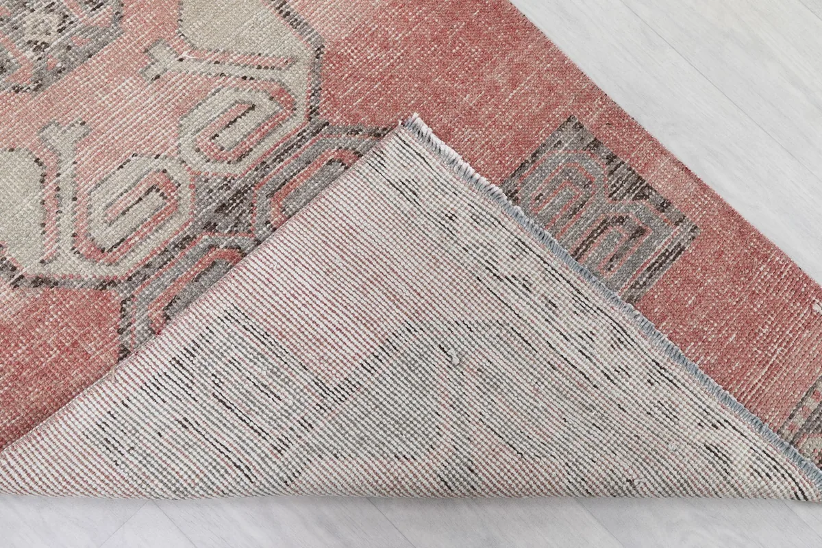 Underside view of the hand-knotted wool pile on cotton foundation of the runner rug