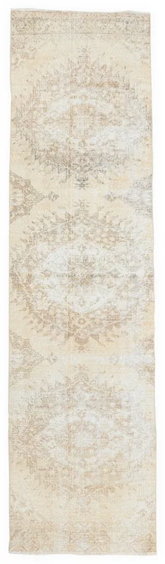 Full top view of the 3x12 beige and tan vintage Anatolian runner rug on a white background.