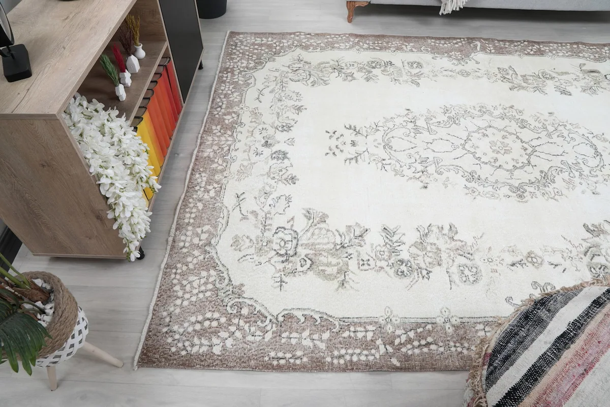 Wide angle view of the rug in a room, showing its placement relative to furniture