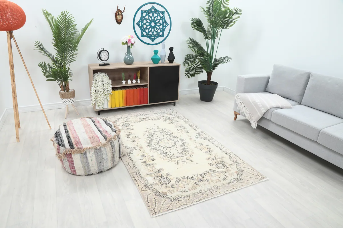 Cream Floral Medallion Anatolian Rug in a living room setting, wider angle