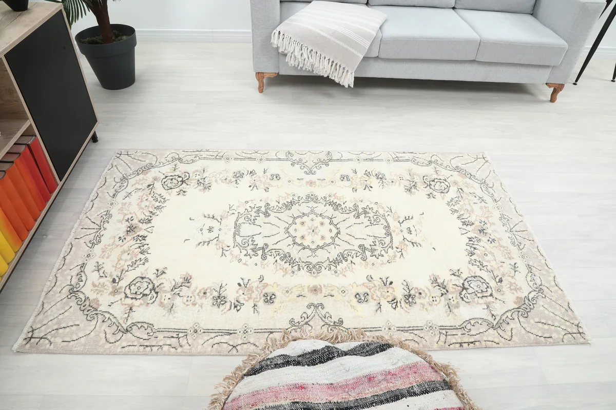 Cream Floral Medallion Anatolian Rug in a room, showing its placement relative to furniture