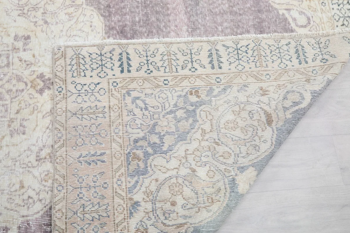 Close-up of the reverse side of the rug, detailing the knotting and foundation structure