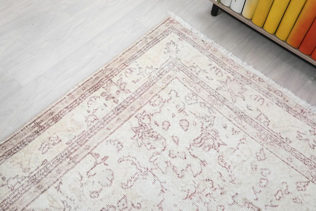 Corner perspective of the rug, highlighting the intricate border design and main field.