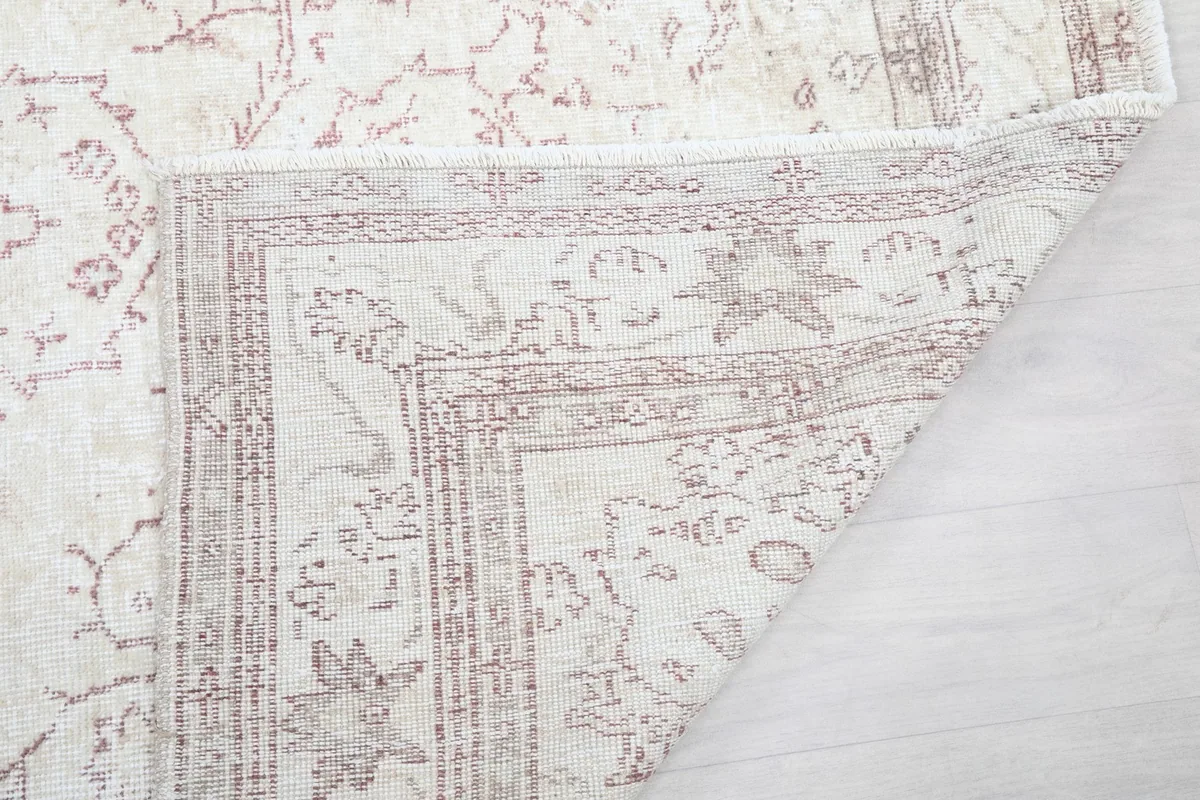Close-up of the rug's reverse side, showing the knotting detail and craftsmanship.