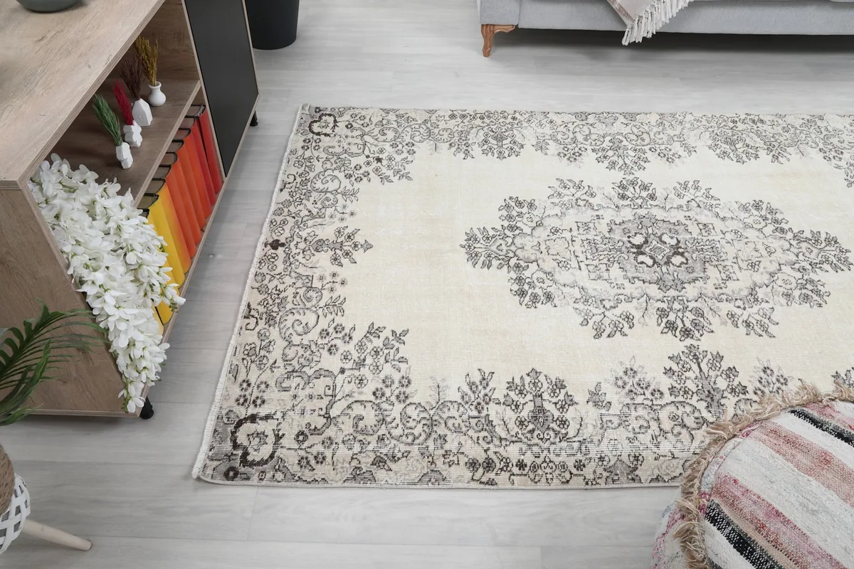 Side view of the rug in the room, highlighting its medium size and design