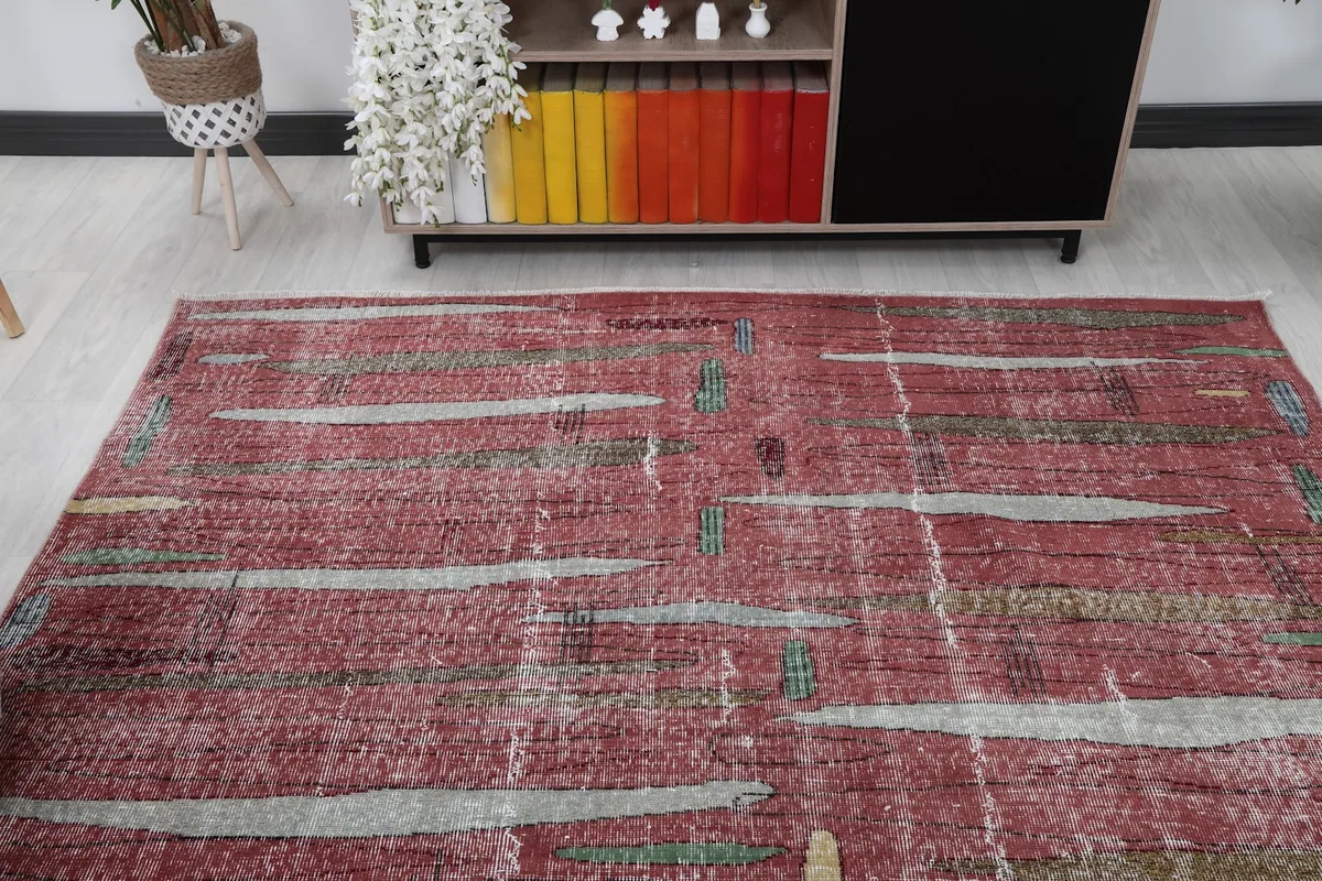 Another room view highlighting the rug's placement and its abstract design from a different angle.