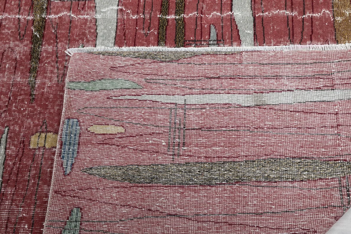 Close-up of the rug's reverse side, showcasing the intricate knotting and craftsmanship.