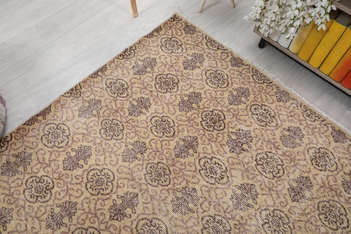Corner view of the rug in a room, showing the subtle color shifts and pattern
