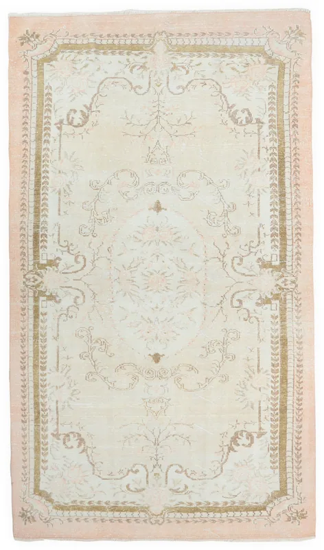 Full overhead view of the ivory and rose vintage Anatolian area rug