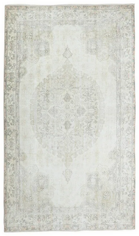 Full overhead view of the 6'11" x 9'11" ivory and gray vintage Anatolian area rug on a white background